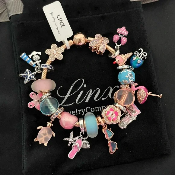 Linx Rose Gold Snake Chain Bracelet with Beach and Summer Themed Charms